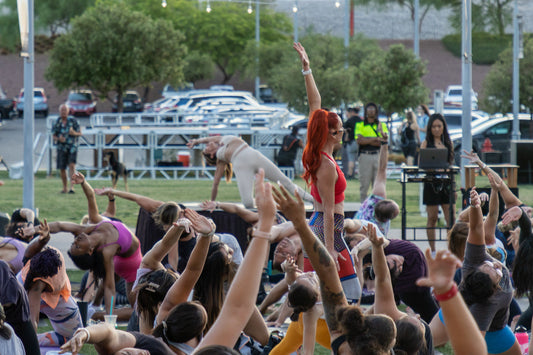 kali jones teaching yoga on the lawn for trufusion