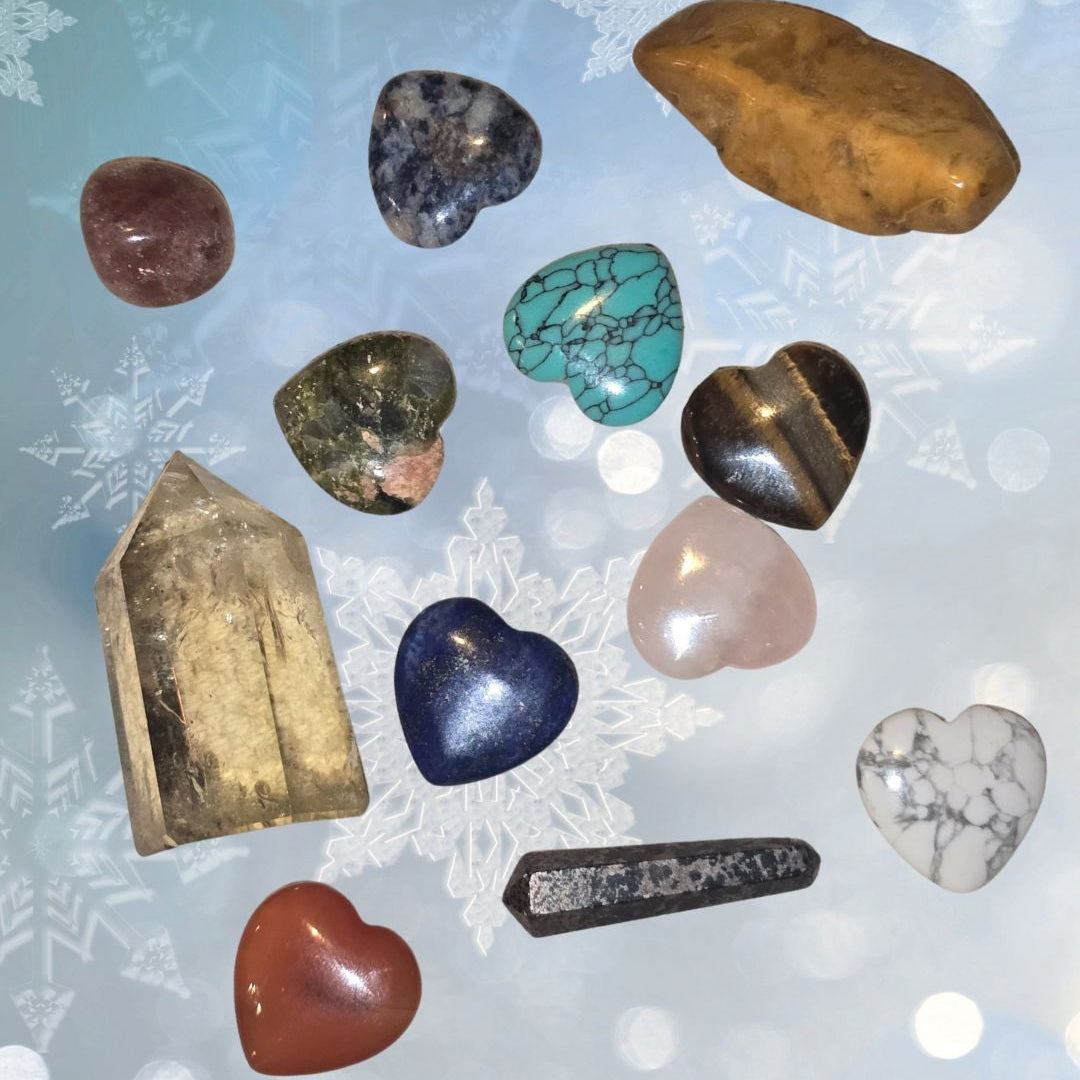 crystal hearts in different stones. tigers eye, amethyst, blue lapis