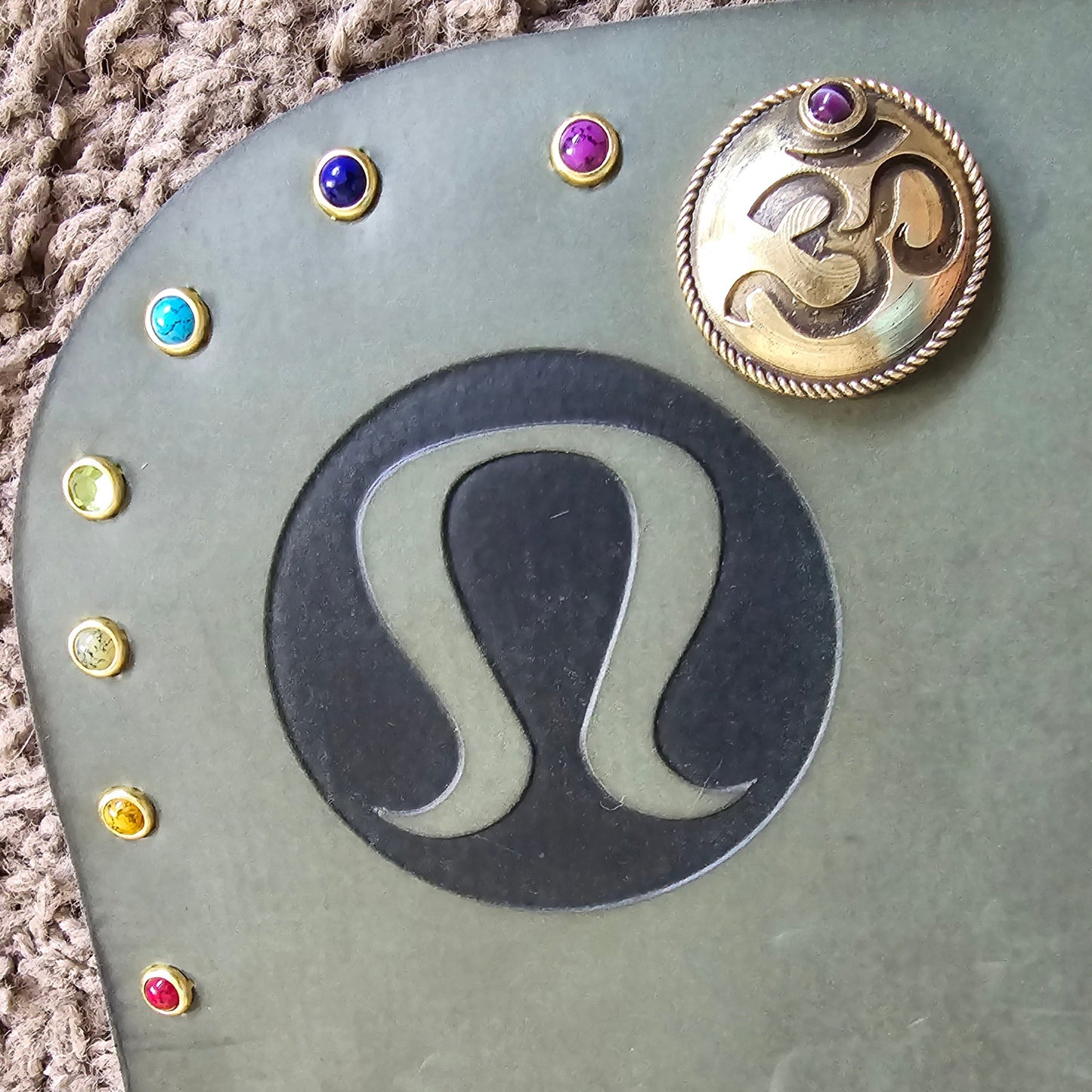 Green yoga mat with Lululemon logo and Om Mat Maker